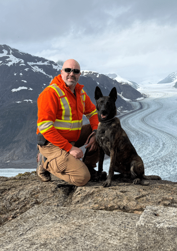 Mark Scheck and Drug Dog in Mountains Mark Scheck and Drug dog in mountains